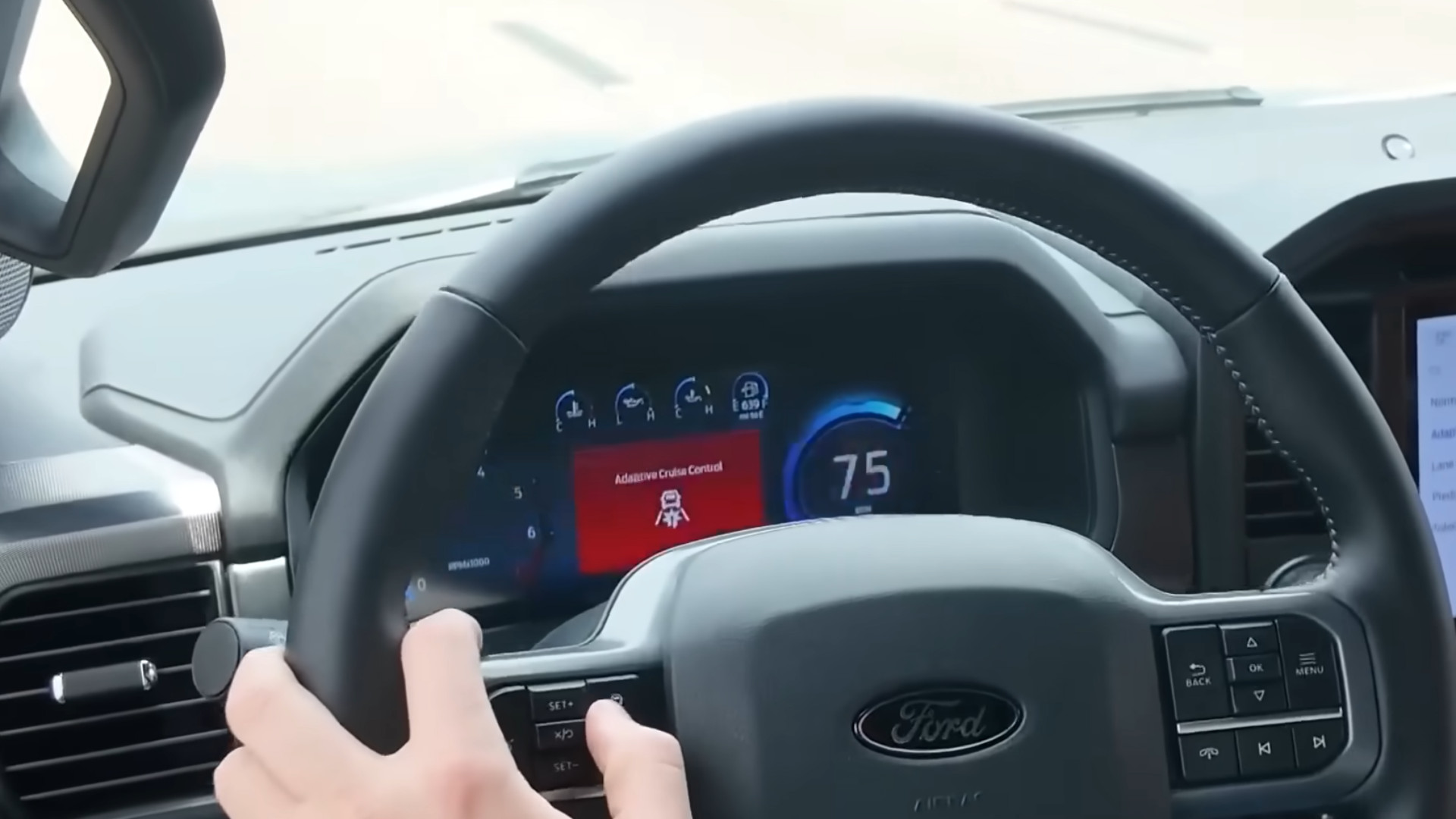 acc-alert-1 A 2024 Ford F-150's adaptive cruise control system displays a collision warning while activating its brakes unexpectedly.