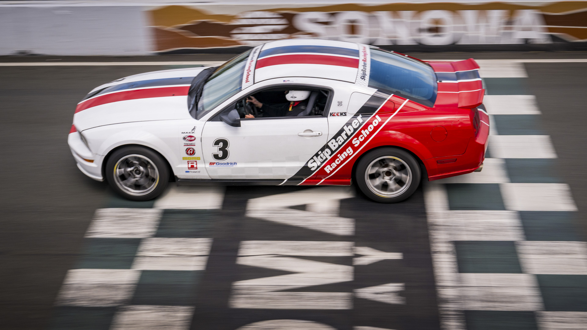 bfg-2pro2-_wbp9895-2 Skip Barber Mustang crossing the finish line at Sonoma Raceway.