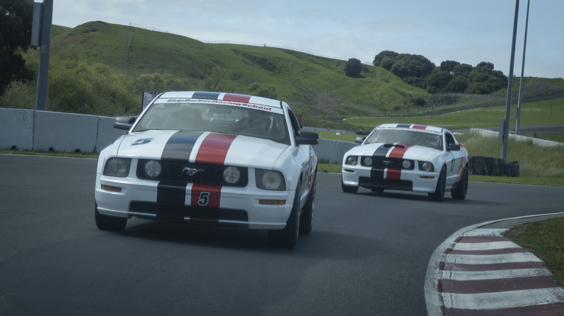 bfg-phenom-e-img_8293 Skip Barber racing school Mustangs in formation.