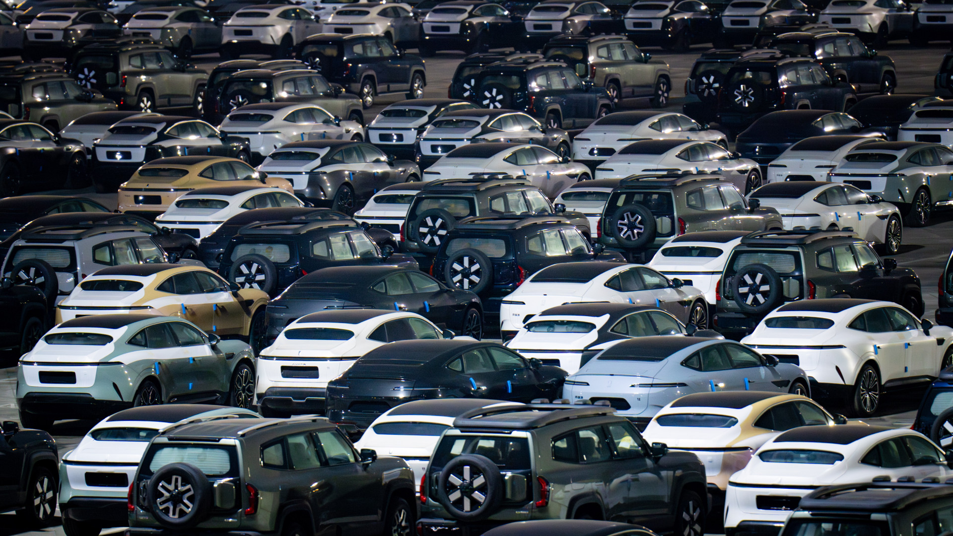china-cars-1 New cars park at Changan Automobile Distribution Center in Chongqing, China, on February 10, 2025.