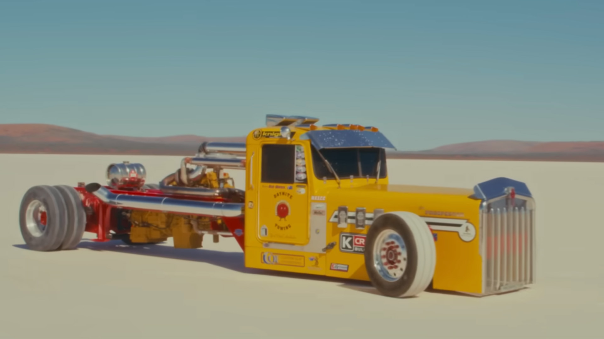 fast-kw-hero-1-1 A modified Kenworth W-Series semi-truck sits on the salt flats.