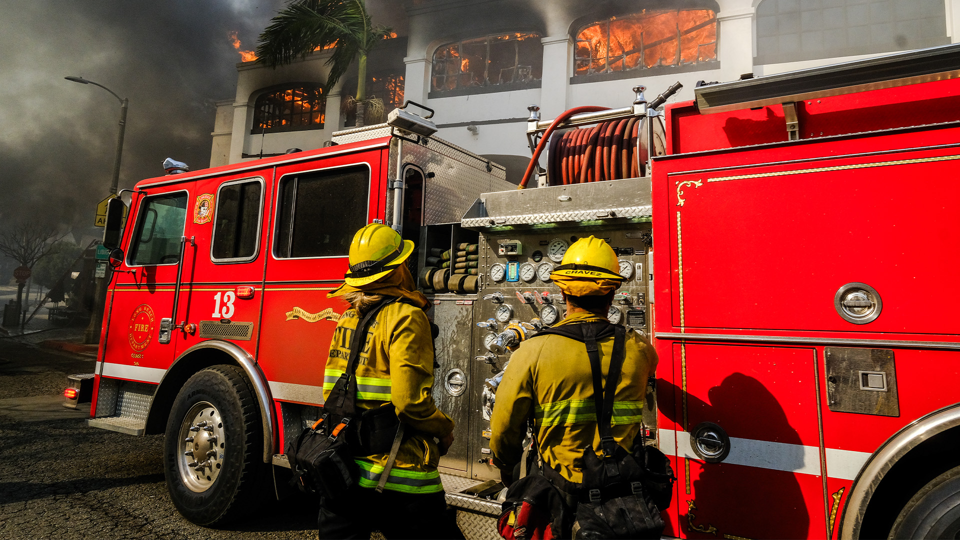 fire-truck-hero-1-1 Firefighters attempt to extinguish a Los Angeles building fire.