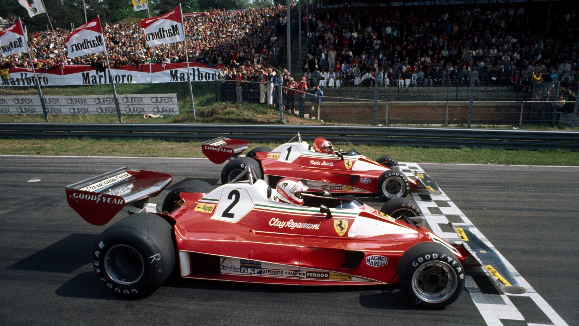 gettyimages-1316306159-1 Clay Regazzoni and Niki Lauda line up before practice in their Ferrari 312T2 racers, Neither one would finish the race, French Grand Prix, Paul Ricard. (Photo by Giuliano Orzali/Klemantaski Collection/Getty Images)