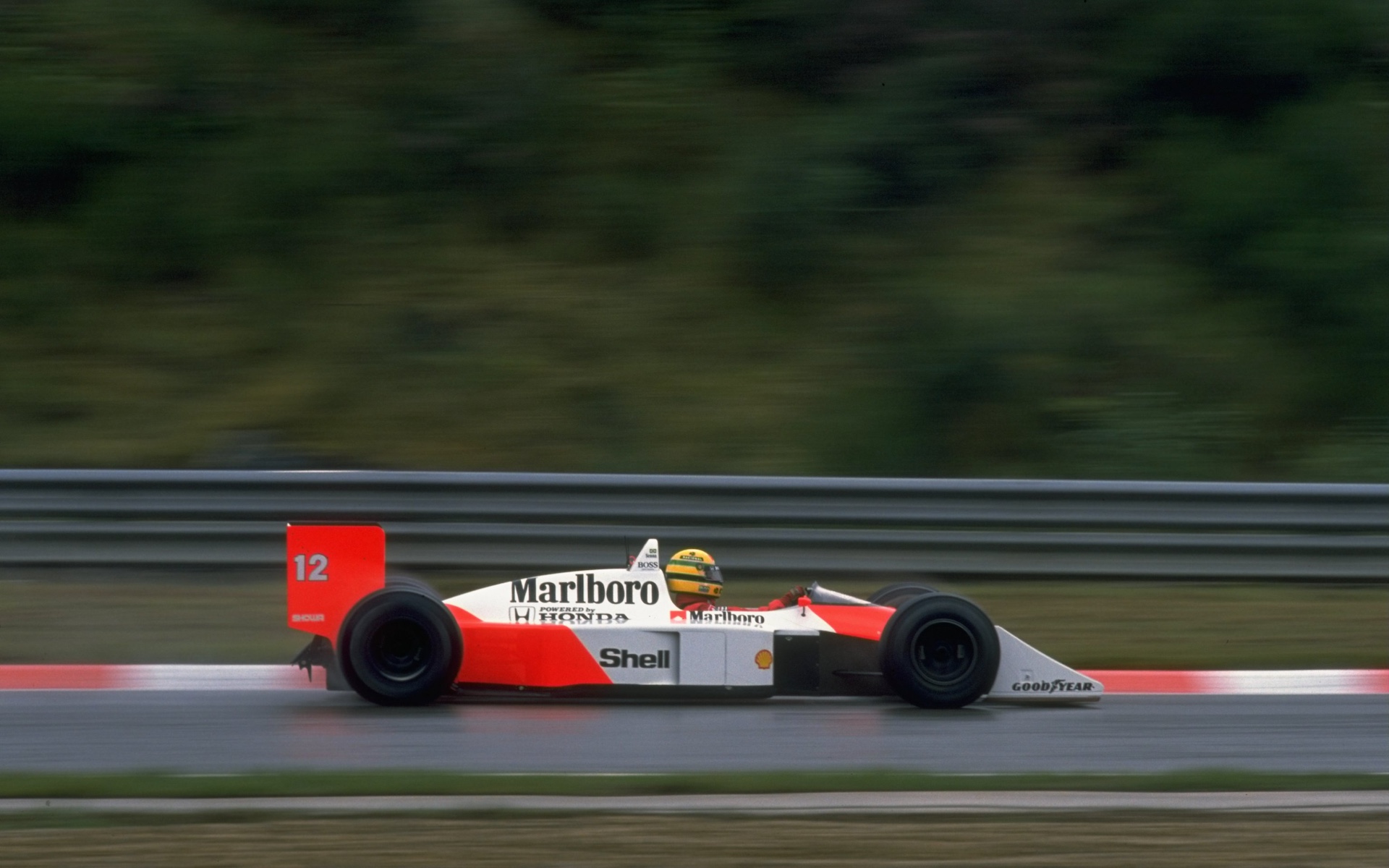 gettyimages-1917301 1988: Ayrton Senna of Brazil in action in his McLaren Honda during the Belgian Grand Prix at the Spa circuit in Belgium. Senna finished in first place. Mandatory Credit: Pascal Rondeau/Allsport