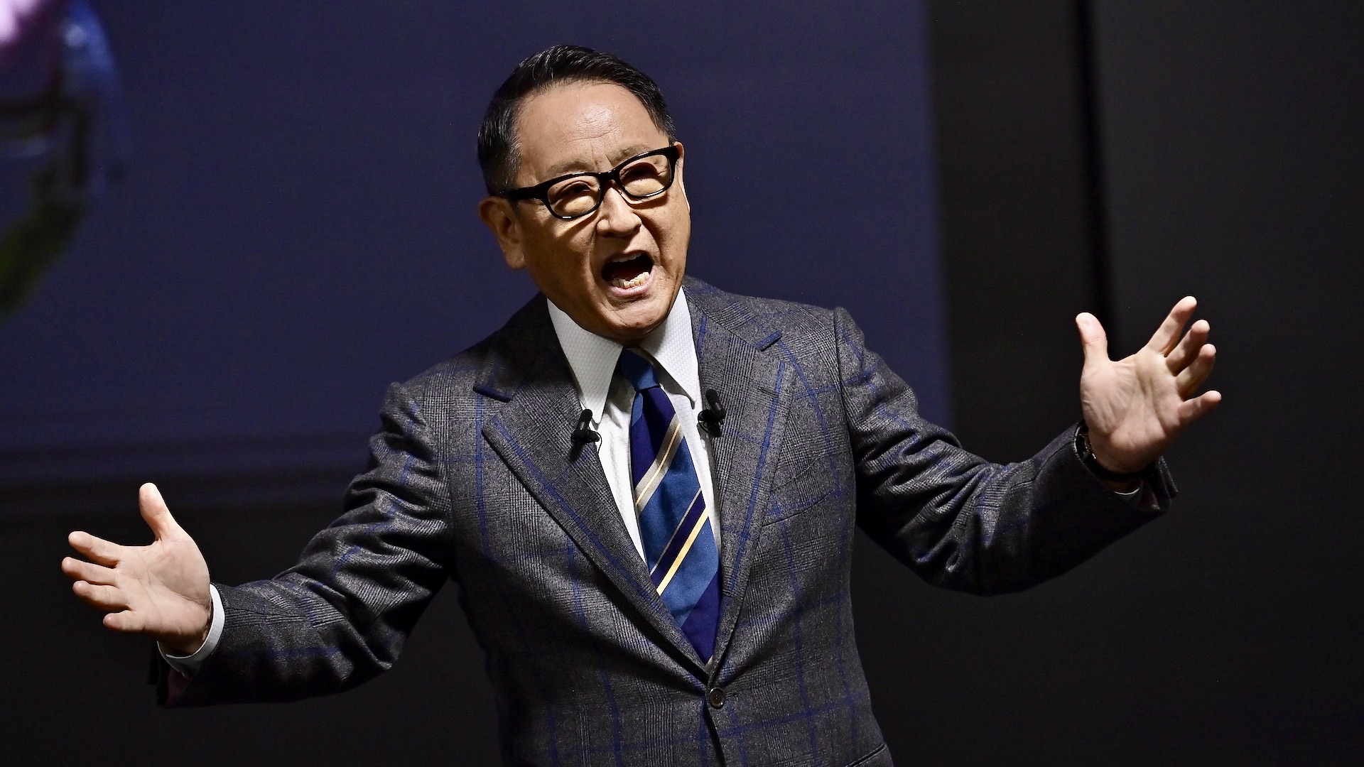gettyimages-1918198555-1 TOKYO, JAPAN - JANUARY 12 : Akio Toyoda, Chairman of Toyota Motor Corp. makes a presentation during the Tokyo Auto Salon at the Makuhari Messe Convention Center in Chiba Prefecture, Tokyo, Japan on January 12, 2024. (Photo by David Mareuil/Anadolu via Getty Images)
