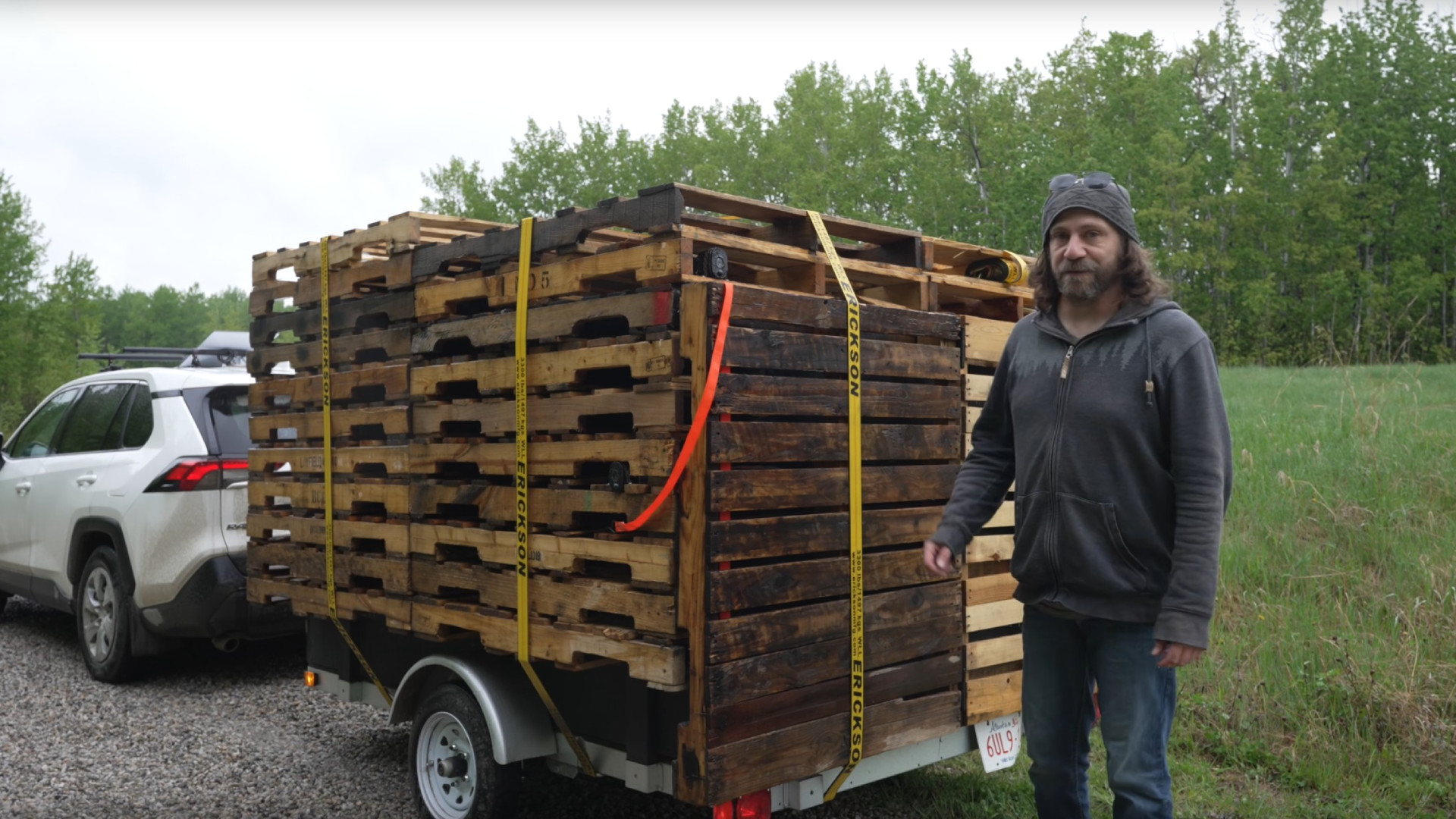 main-1 A stealth camper trailer disguised as a stack of wooden pallets.