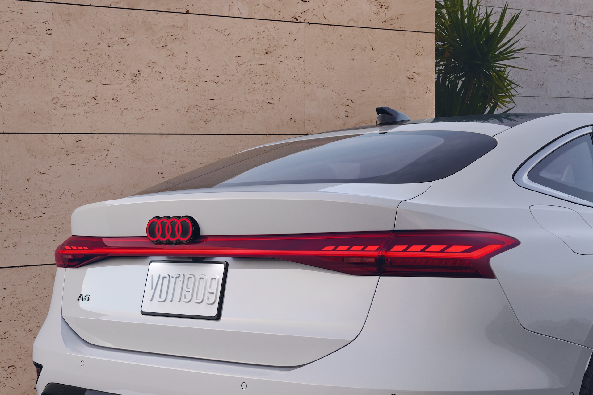 medium-14416-my25-a6-sportback-e-tron-exterior-rear-profile-parked-5930