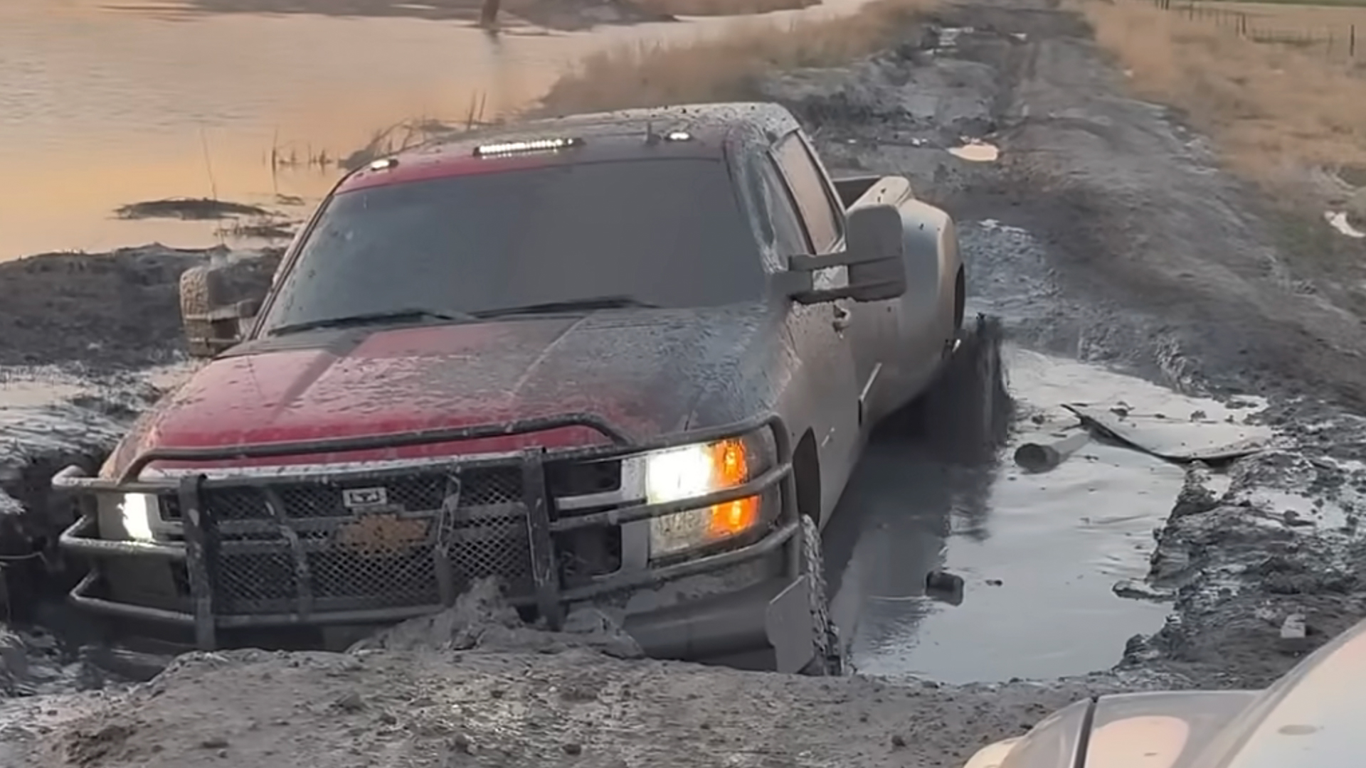 road-of-shame-devin-davis-1-1 Chevrolet pickup stuck in mud on the Road of Shame