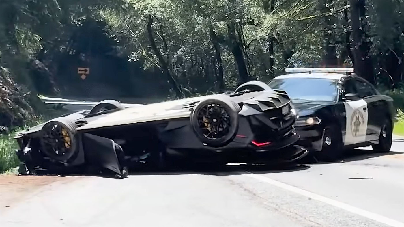 screenshot-2025-05-06-124351-copy-1 Crashed, overturned Lamborghini Huracan being pushed across road by patrol car.