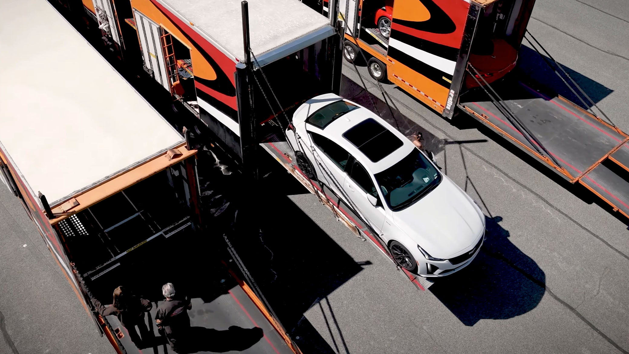 screenshot-2025-05-07-162916-copy Cadillac sedan being unloaded from transporter for Secret Service use.