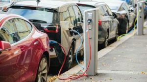 Electric cars charging on the street
