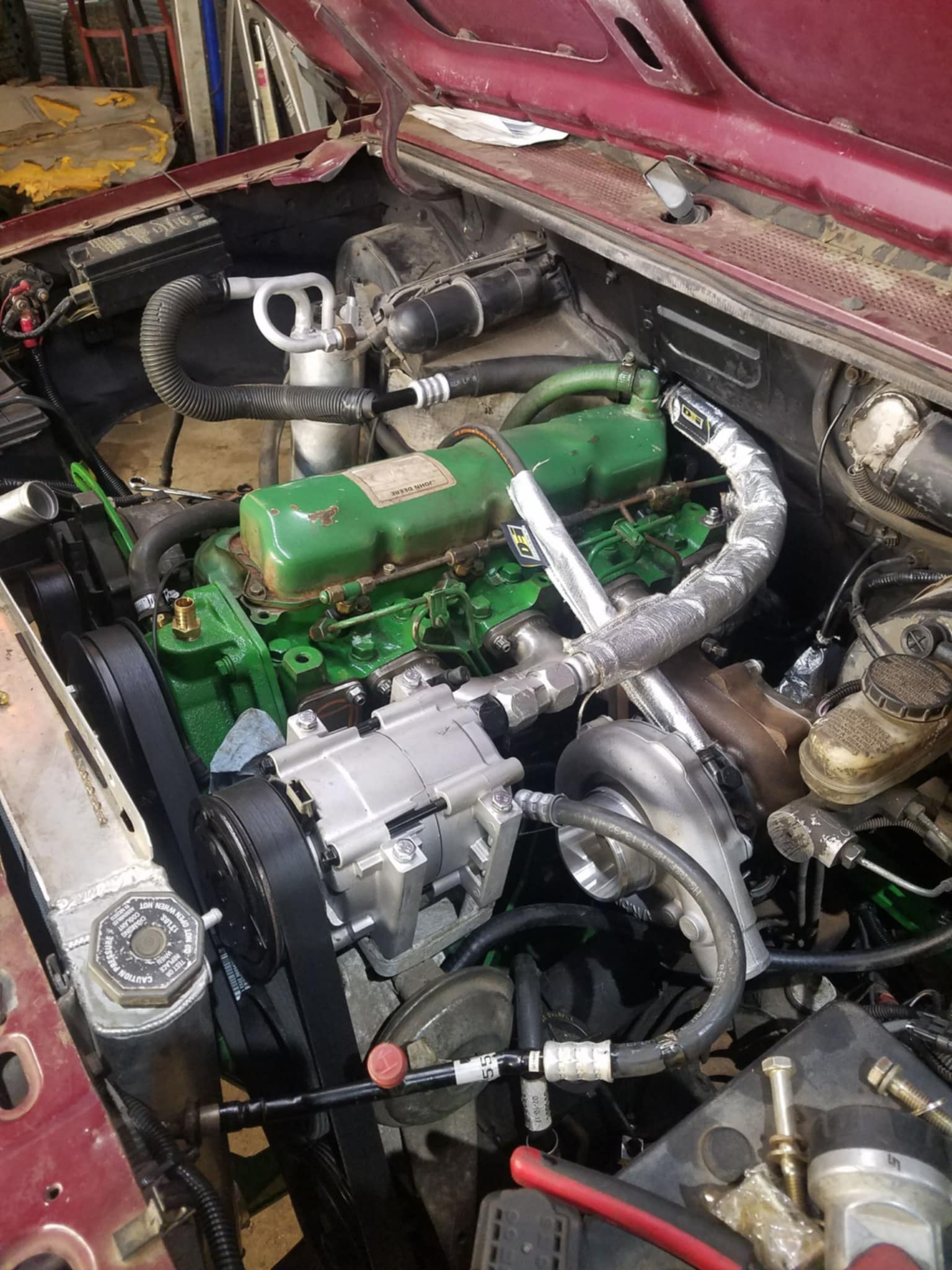 b2c137aa-1202-4b2f-a0b2-3aa6e596e184 John Deere engine-swapped Ford Ranger