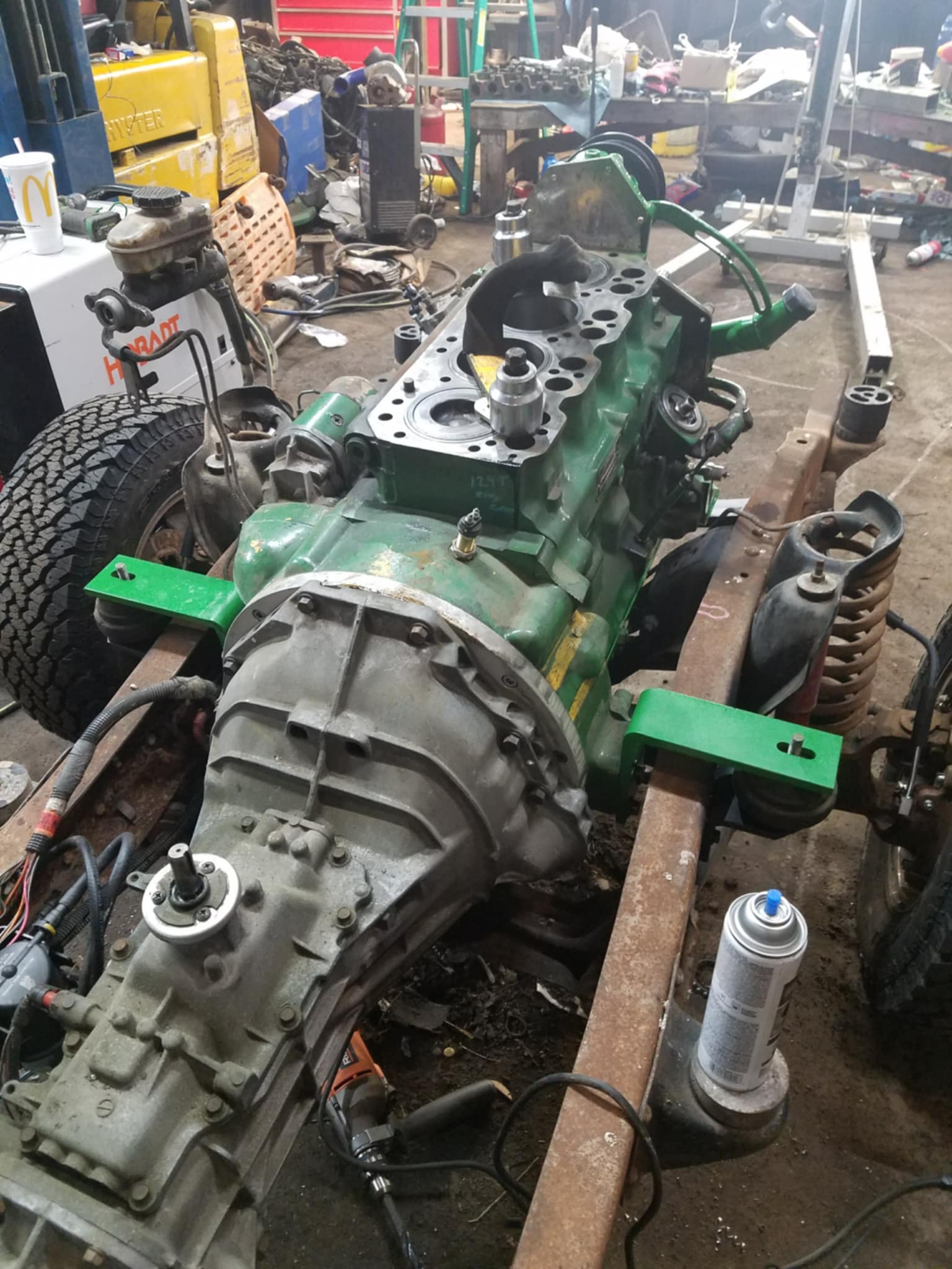 d56bf354-0cfd-4200-90cb-44d52e758c8e John Deere engine-swapped Ford Ranger
