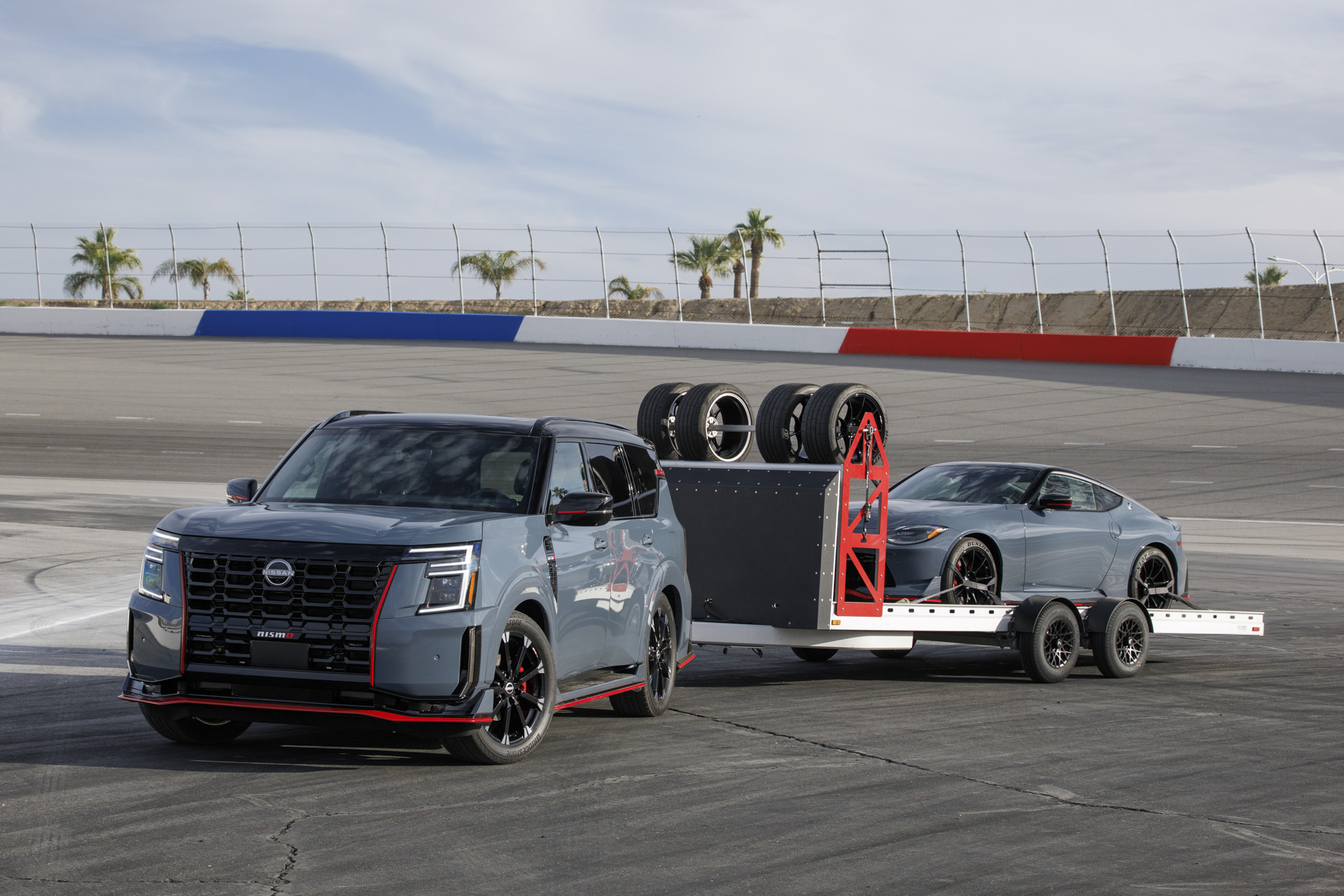 Nissan Armada Nismo towing a Nissan Z