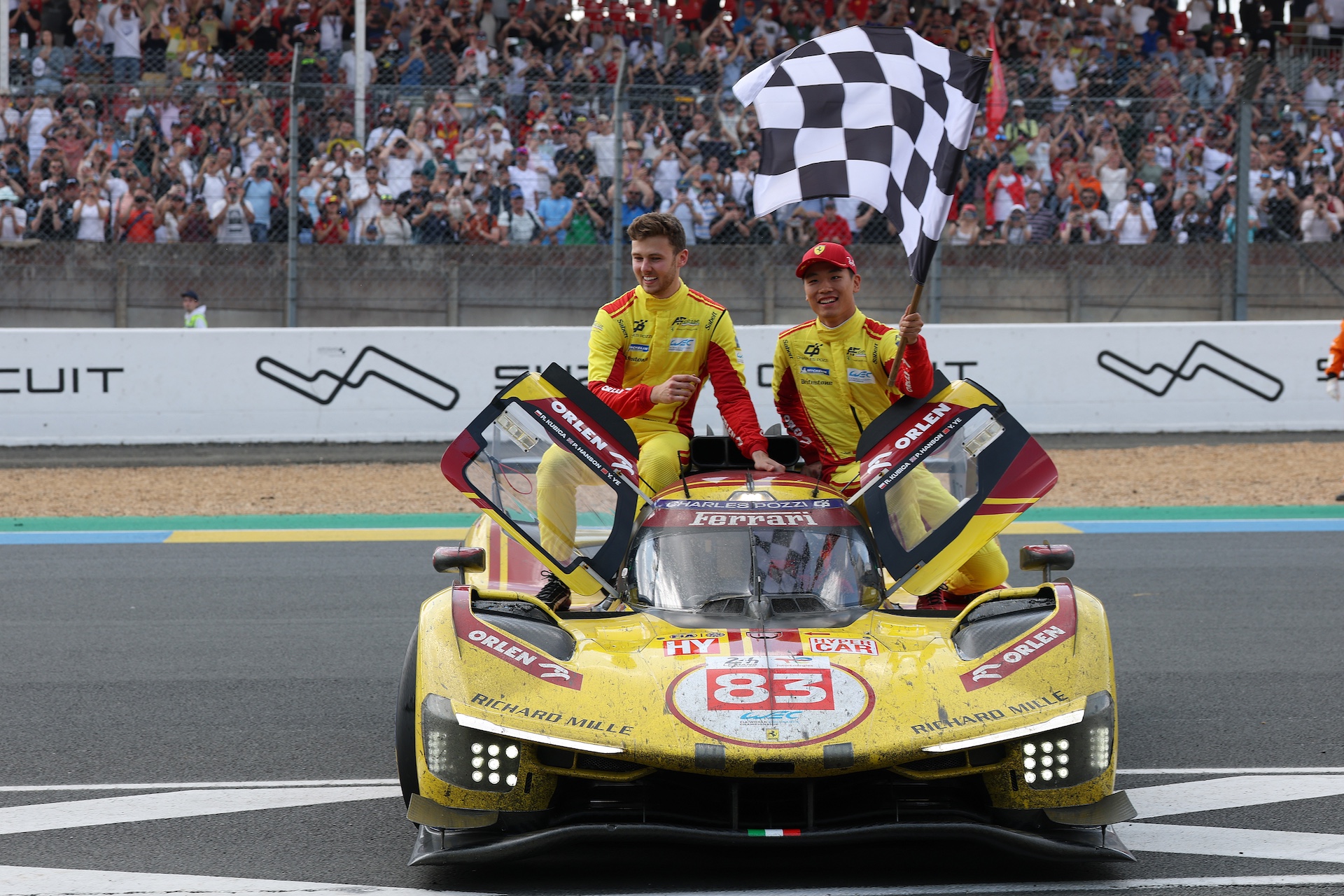 gettyimages-2220343853 LE MANS, FRANCE - JUNE 15: #83 AF Corse Italy Ferrari 499P (HY). Pilots Robert Kubica of Poland, Yifei Ye of China, Philip Hanson of the United Kingdom, winners of the Le Mans 24 Hours race, the fourth round of the 2025 FIA WEC Championship, on the Le Mans 24 Hours circuit on 14 and 15 June 2025 in France. (Photo by Philippe Nanchino/Eurasia Sport Images/Getty Images)