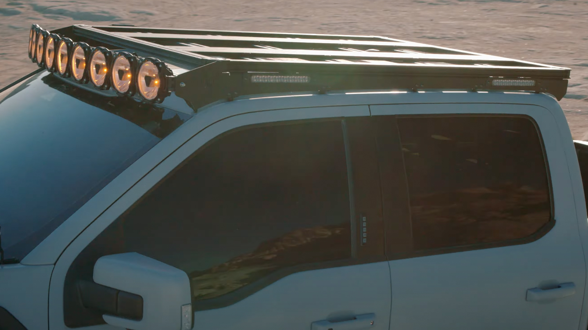 kc6 Detail view of KC Hilites Platform One roof rack.