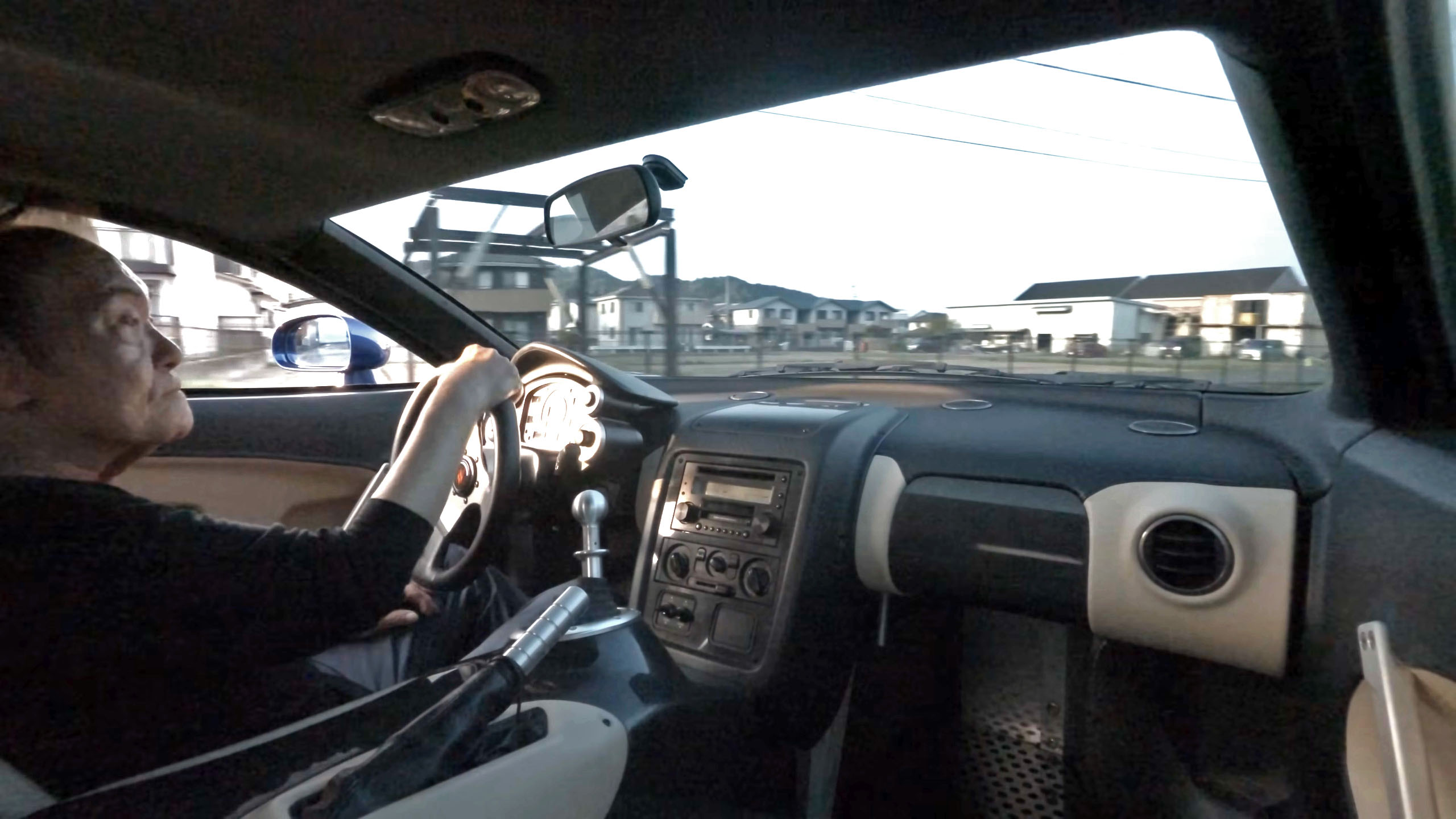 screenshot-2025-06-02-092654-copy Yoshikazu Tomita drives a Tommykaira ZZII.