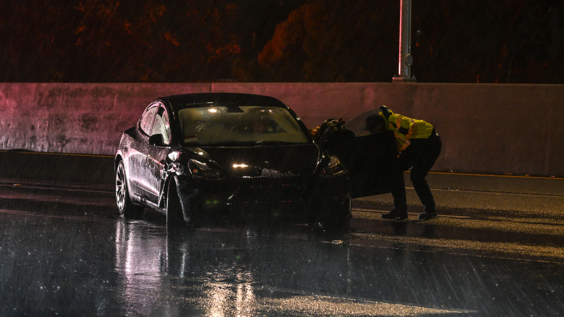 tesla-crash-sf-1 Four cars including a Tesla were involved an accident during heavy rain on Highway 101 southbound in San Mateo, California, United States on March 21, 2023 as atmospheric river storms hit California.